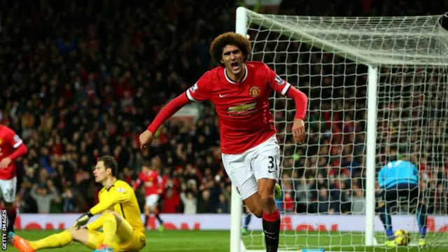 Marouane Fellaini celebrates scoring for Manchester United