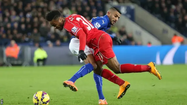 Raheem Sterling gives the ball away