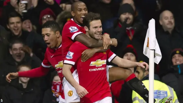 Juan Mata celebrates Manchester United's second goal