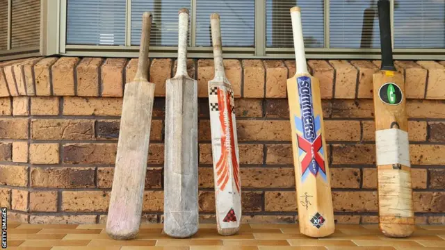 Bats put out in Macksville in memory of Phillip Hughes