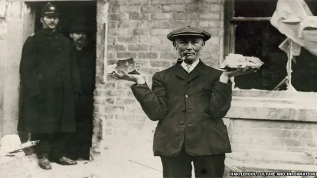 Man holding shell fragments found in Girvan Terrace, off Throston Street in West Hartlepool