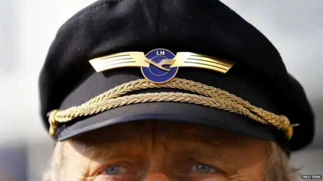 A pilot of German airline Lufthansa taking part in a demonstration during strike action at the Fraport airport in Frankfurt April 2, 2014