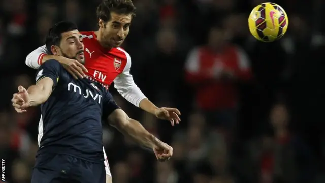 Graziano Pelle battles with Mathieu Flamini for the ball