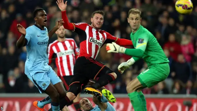 Sunderland striker Connor Wickham scores against Manchester City