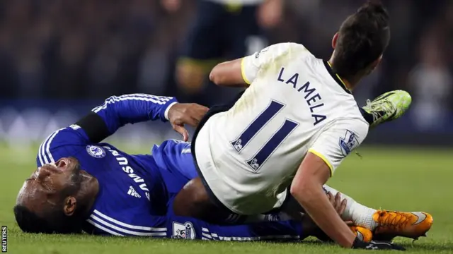 Didier Drogba suffers an injury after a challenge with Eric Lamela