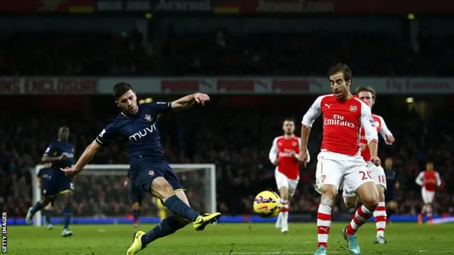 Shane Long shoots towards goal for Southampton