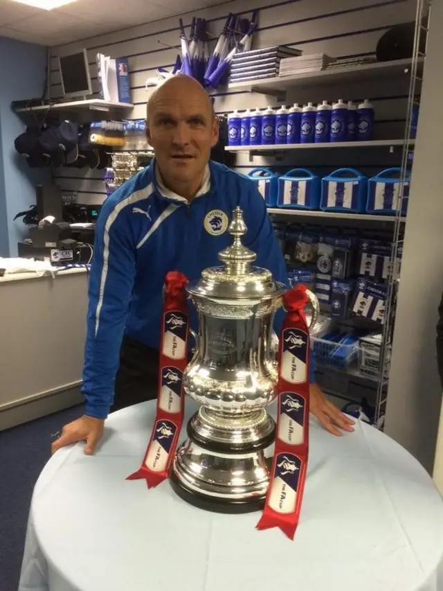 Chester boss Steve Burr spends some quality time with the Cup