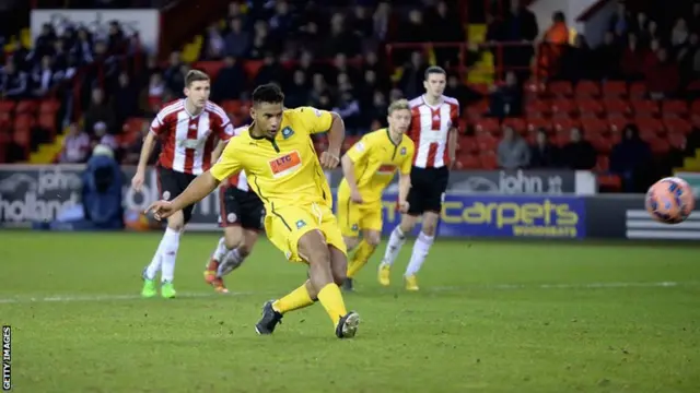 Reuben Reid misses a spot-kick