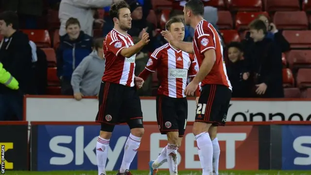 Jose Baxter celebrates his second goal