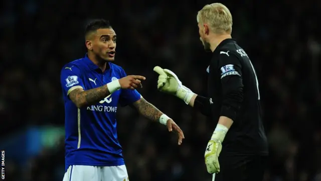 Leicester defender Danny Simpson and goalkeeper Kasper Schmeichel discuss tactics