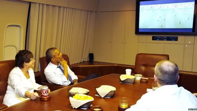 Barack Obama watching football