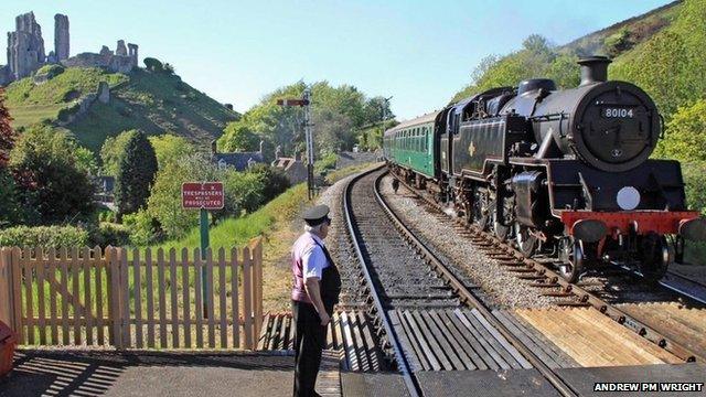 A steam train on the Swanage Railway line at Corfe Castle