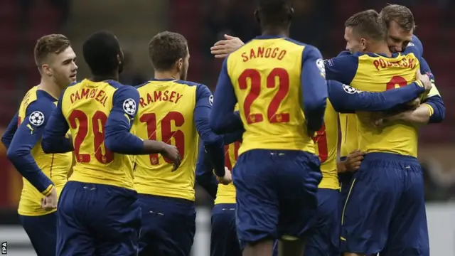 Arsenal's Lukas Podolski celebrates