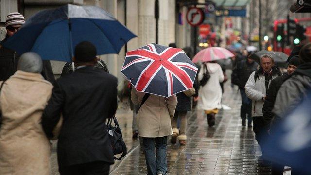 people walking in the rain