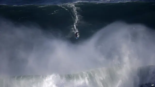 A surfer at Nazare