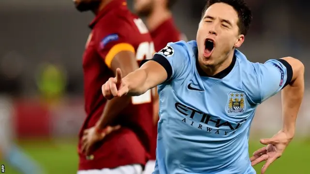 Samir Nasri celebrates for Man City