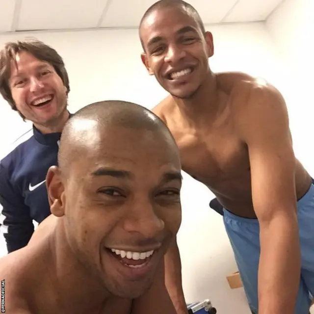 Fernandinho and City staff celebrate