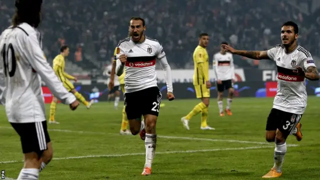 Besiktas celebrate their opening goal against Tottenham