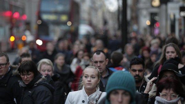 People walking along the streets of London