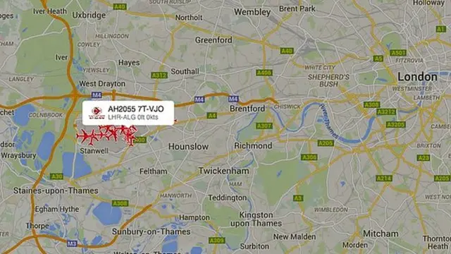 Map of London showing aircraft icons over Heathrow area