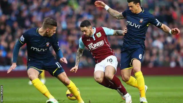 Danny Ings heads towards goal for Burnley