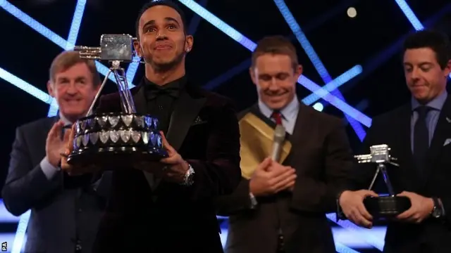 Presenter Gary Lineker (left) and Lewis Hamilton during the 2014 Sports Personality of the Year Awards