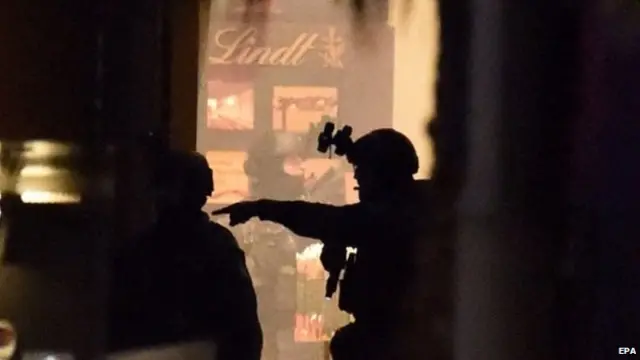 Police storm the Lindt cafe in Sydney