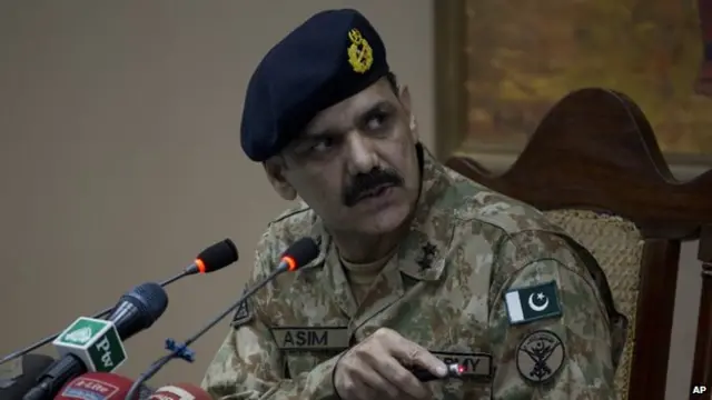 Pakistani army spokesman Maj Gen Asim Bajwa briefs the media