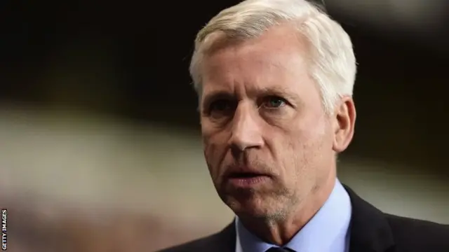 Alan Pardew looks on