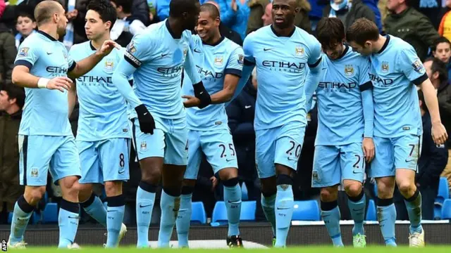 Man City players celebrate