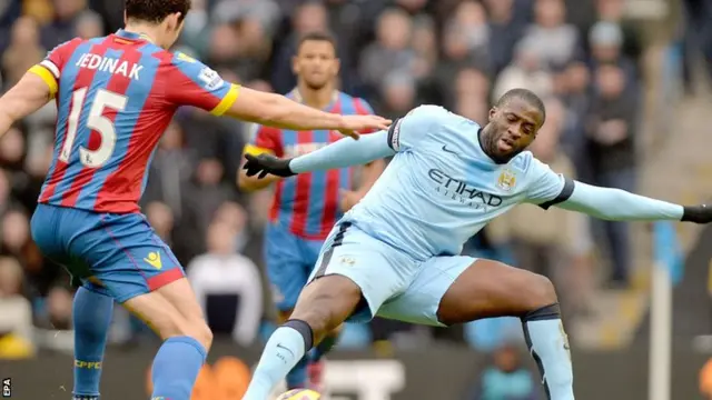 Mile Jedinak and Yaya Toure