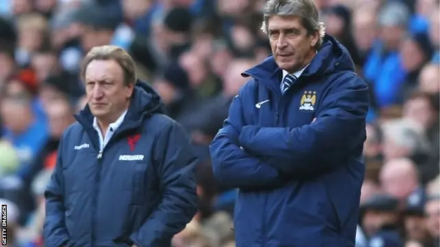 Manuel Pellegrini looks on