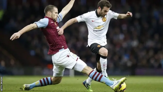 Juan Mata is tackled