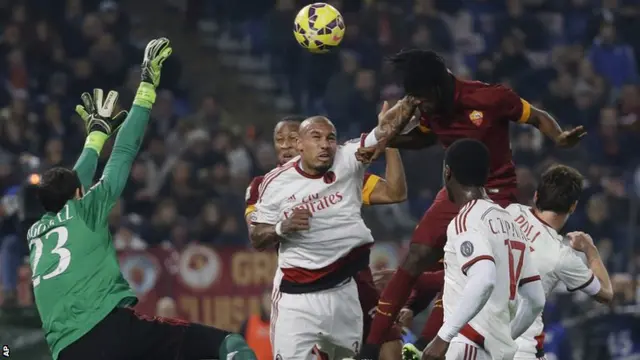 Nigel de Jong handles the ball in his own box