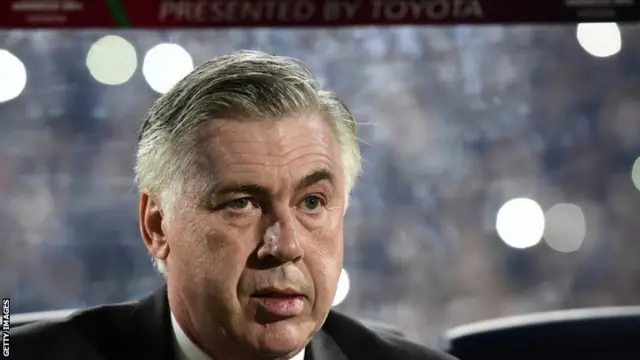 Carlo Ancelotti looks on