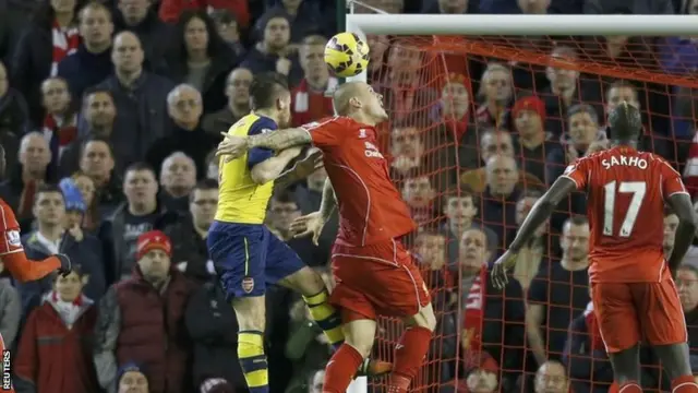 Mathieu Debuchy heads in a goal