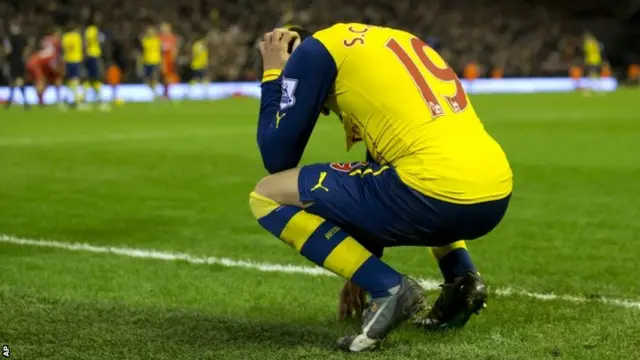 Santi Cazorla reacts