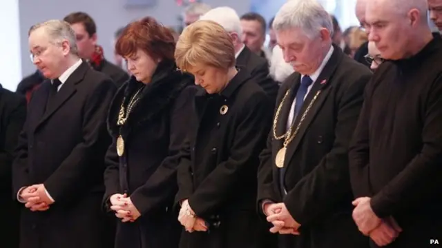 A minutes silence is observed by (left to right) Gordon Matheson, Glasgow Lord Provost Sadie Docherty, First Minister Nicola Sturgeon, Glasgow Deputy Lord Provost Gerald Leonard