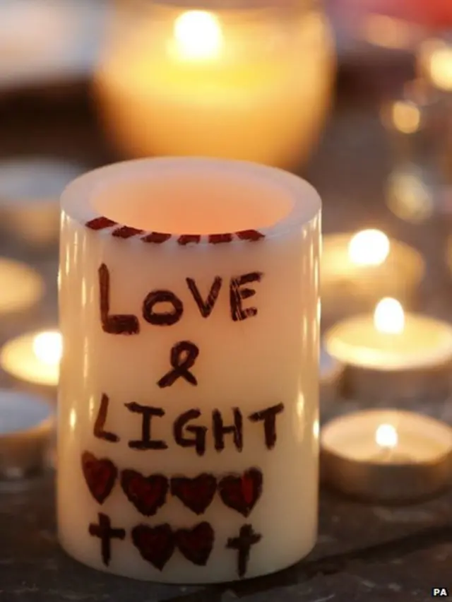 Candles lit near the scene of the fatal crash