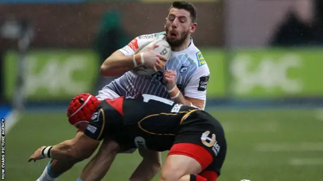 Tyler Morgan crashes into Blues wing Alex Cuthbert