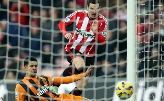 Adam Johnson scores