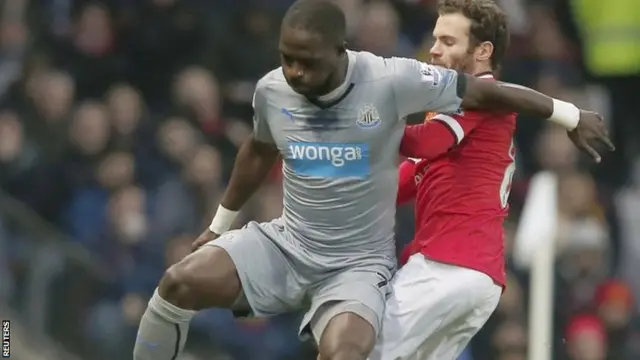 Moussa Sissoko and Juan Mata