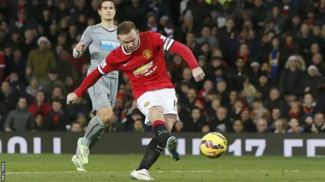 Wayne Rooney scores