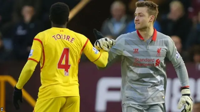 Simon Mignolet and Kolo Toure