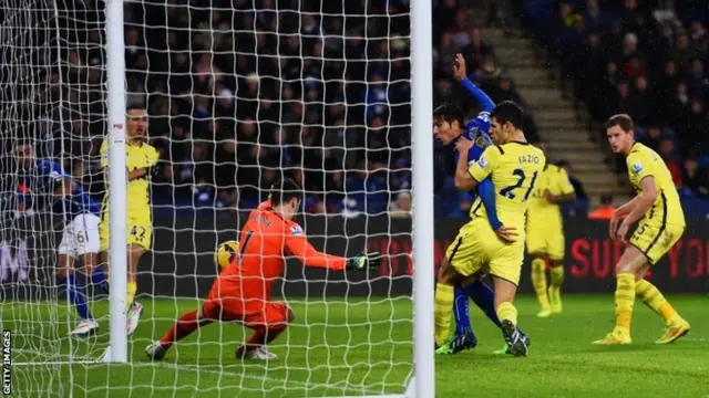 Leonardo Ulloa scores