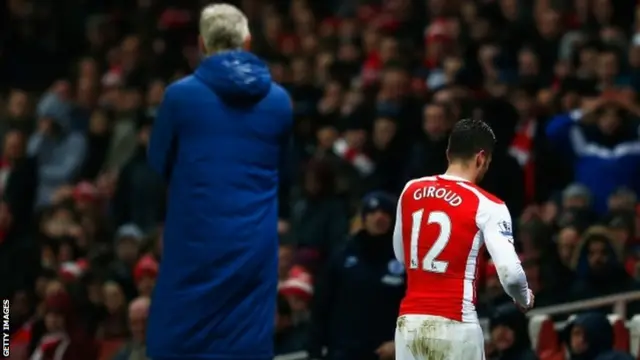 Olivier Giroud leaves the field after being sent off