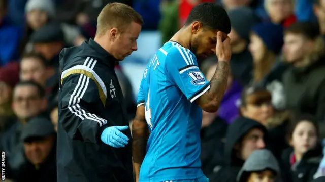 Sunderland's Liam Birductt leaves the pitch with an injury