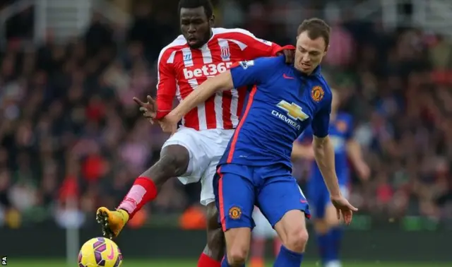 Mame Biram Diouf battles with Jonny Evans