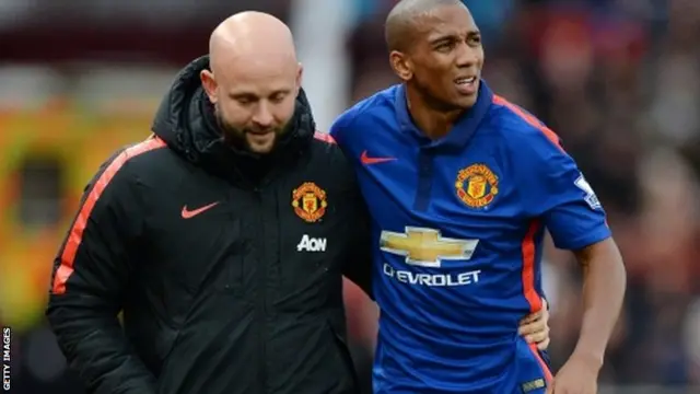 Ashley Young leaves the field injured