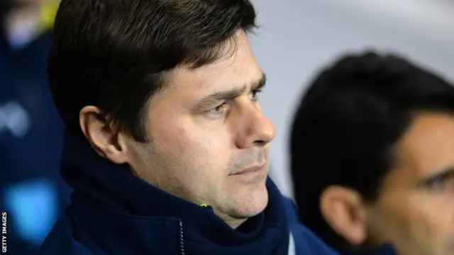 Mauricio Pochettino looks on